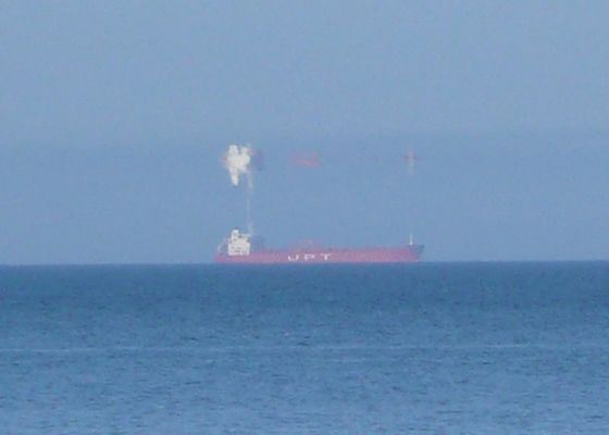 Неожиданный верхний мираж на море Неожиданный верхний мираж на море